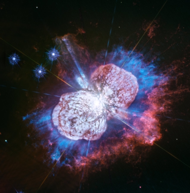 Cosmic Fireworks in Ultraviolet Image of clouds of cosmic dust emerging from the Eta Carinae star system