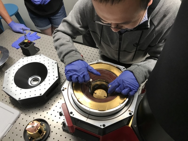 Photo of researchers at Northwestern University installing an OptiCool magnetic sensor