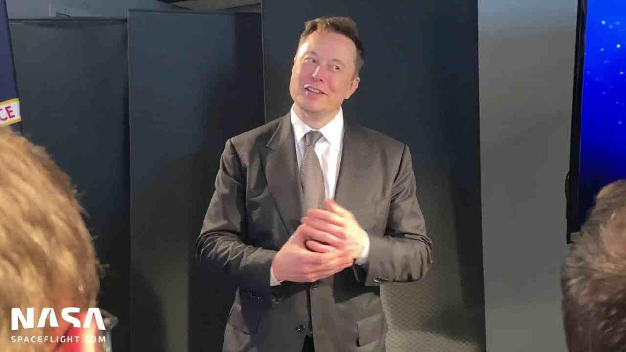 Elon Musk chats with the media following SpaceX's successful inflight abort test